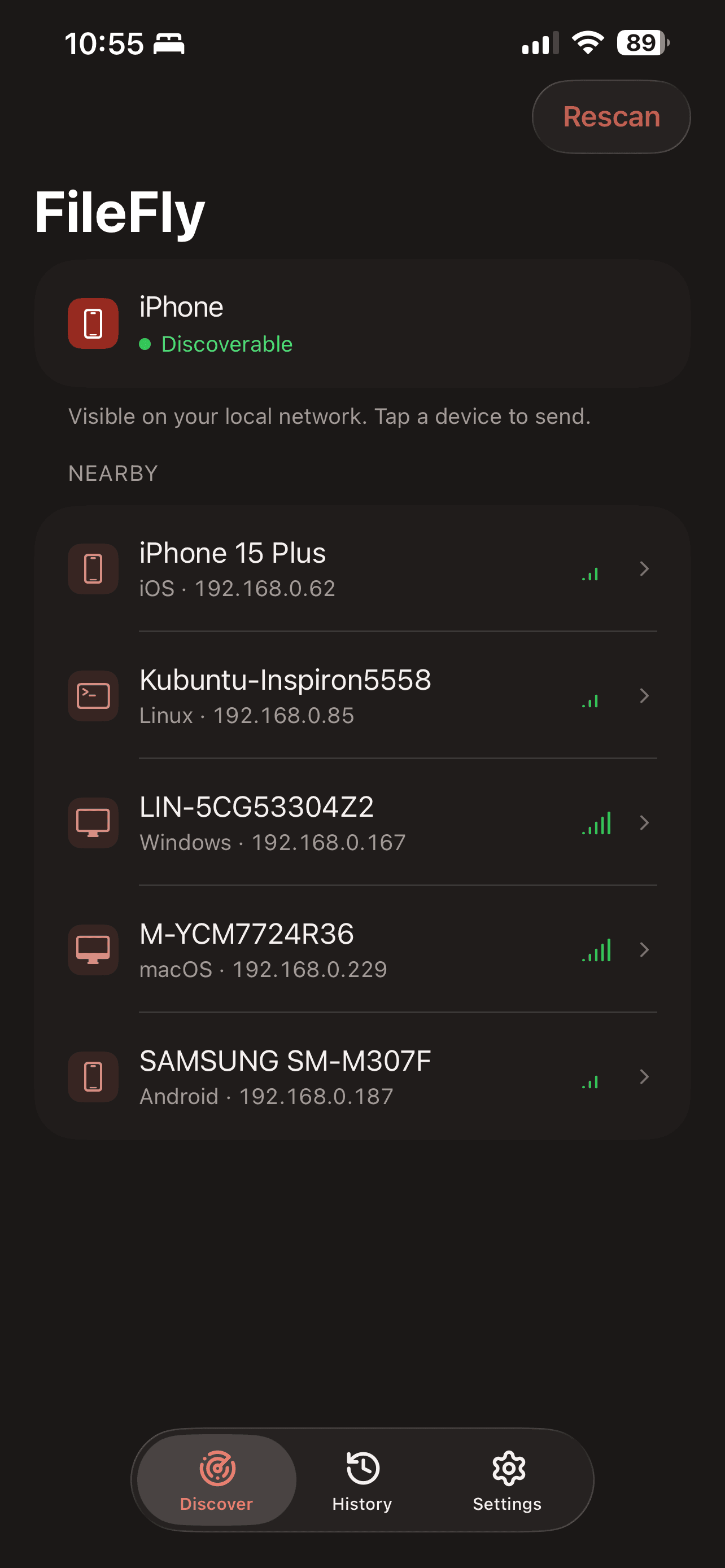 The FileFly device list on iPhone: the phone's own Discoverable card above a Nearby list of Windows, macOS, Linux and Android devices