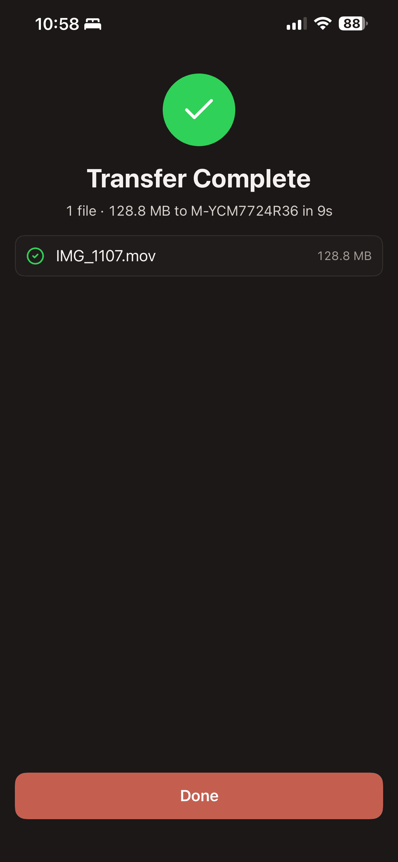 The Transfer Complete screen showing one file of 128.8 MB delivered in nine seconds